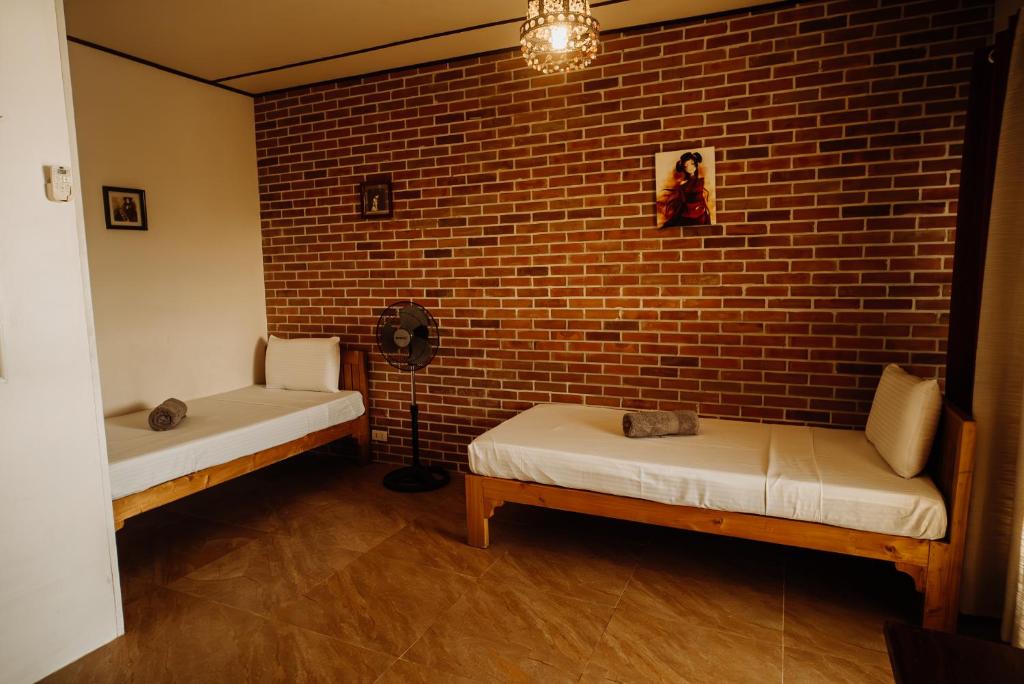 Postel nebo postele na pokoji v ubytování Fantasy Lodge