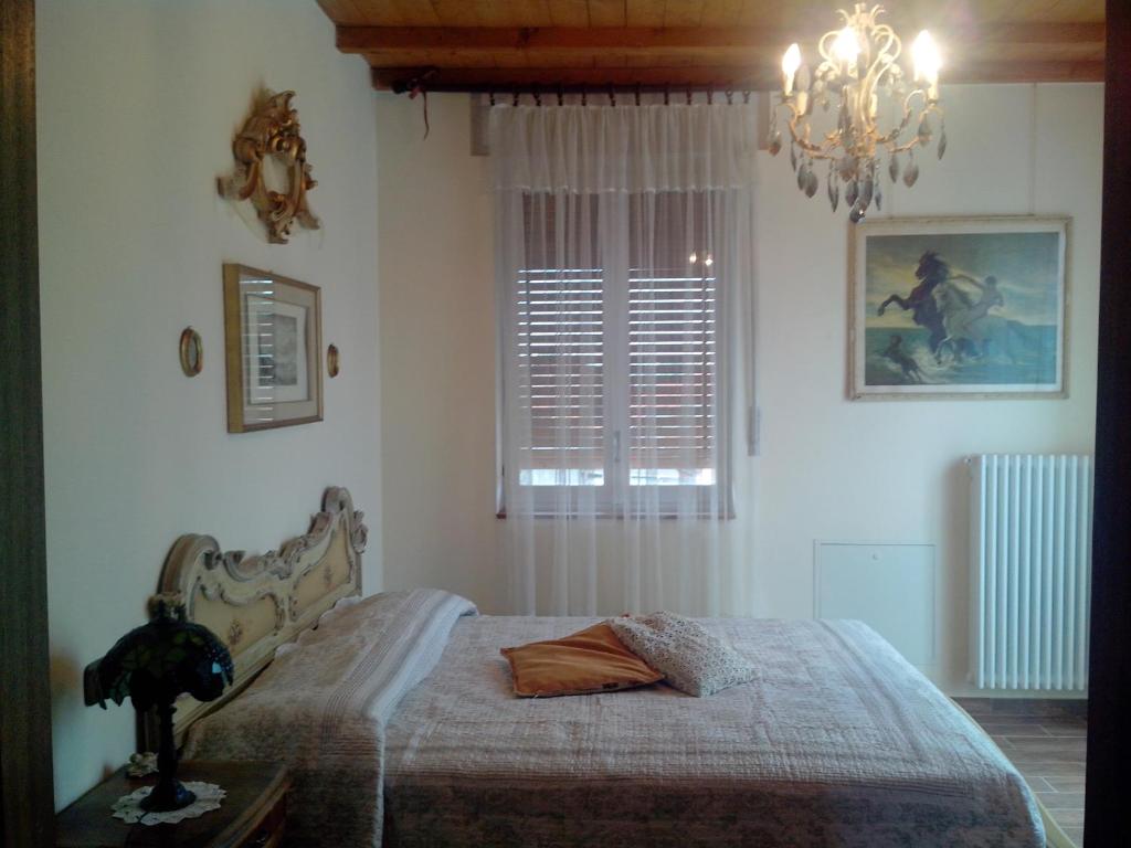 Postel nebo postele na pokoji v ubytování B&B CM Ranch