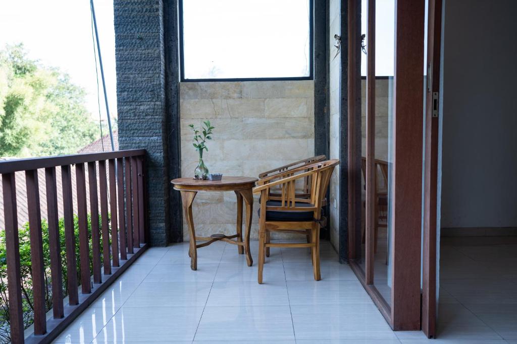 Balkón nebo terasa v ubytování Adipana Bungalow-Balinese Room