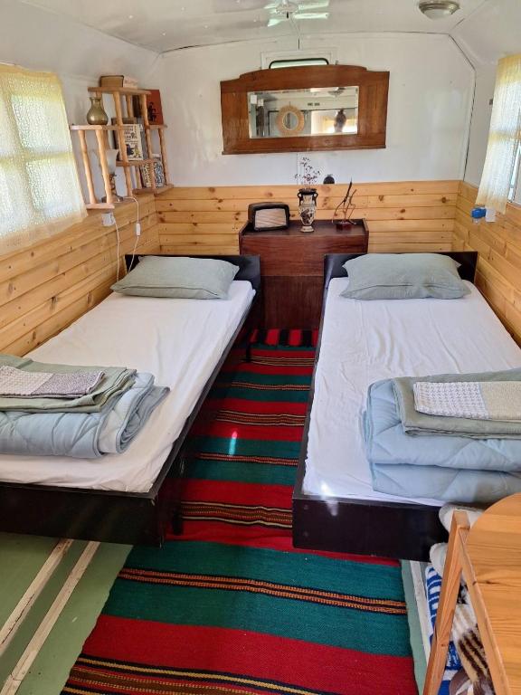 Postel nebo postele na pokoji v ubytování Ecopark Sadzhaka