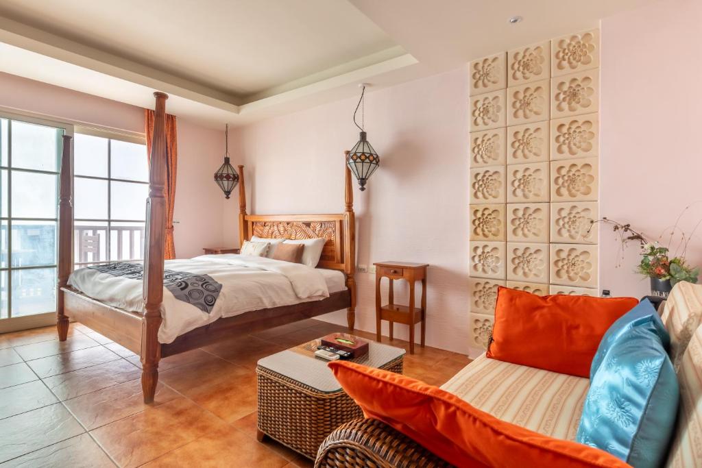 Postel nebo postele na pokoji v ubytování Kenting Shen's Homestay
