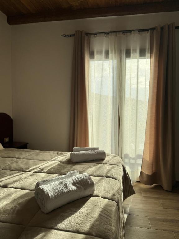 Postel nebo postele na pokoji v ubytování Is Cubas