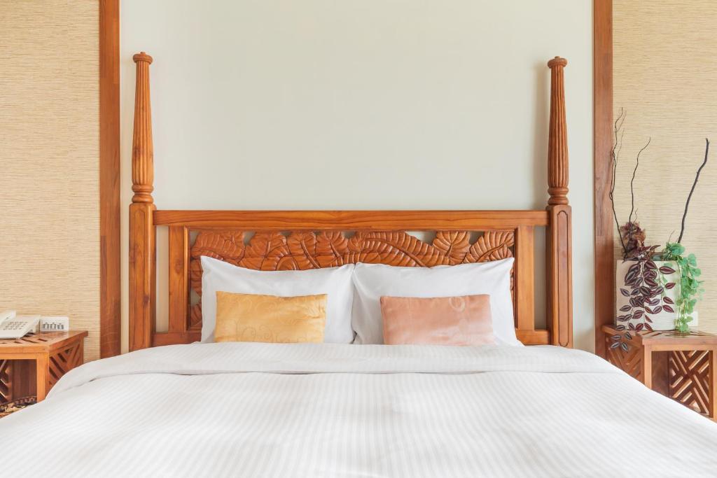Postel nebo postele na pokoji v ubytování Kenting Shen's Homestay