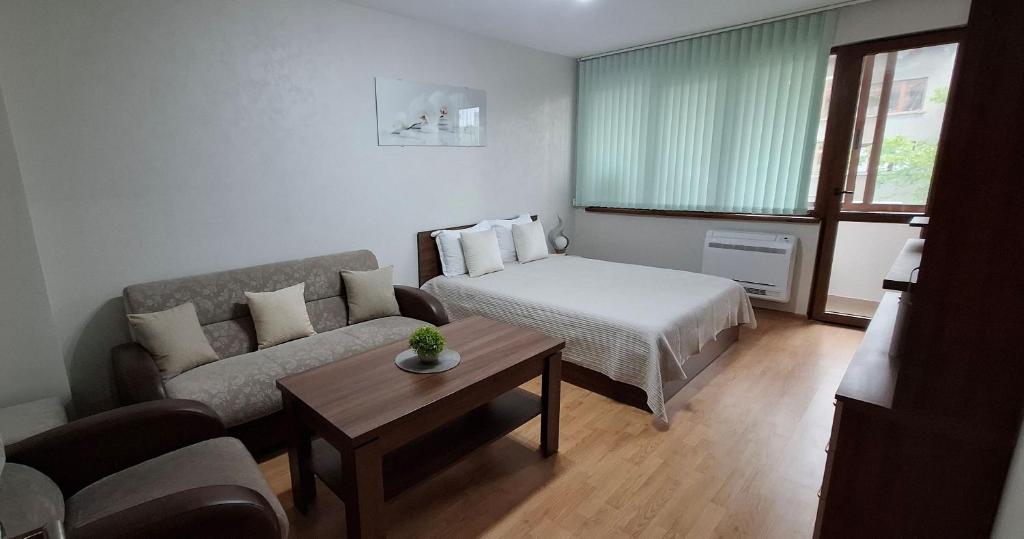 Postel nebo postele na pokoji v ubytování Апартамент Миг