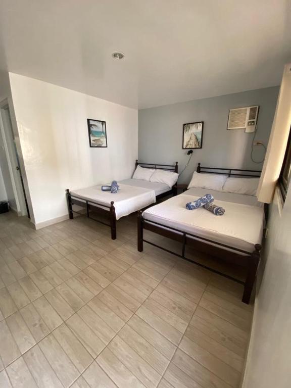 Postel nebo postele na pokoji v ubytování Marion Roos Hotel