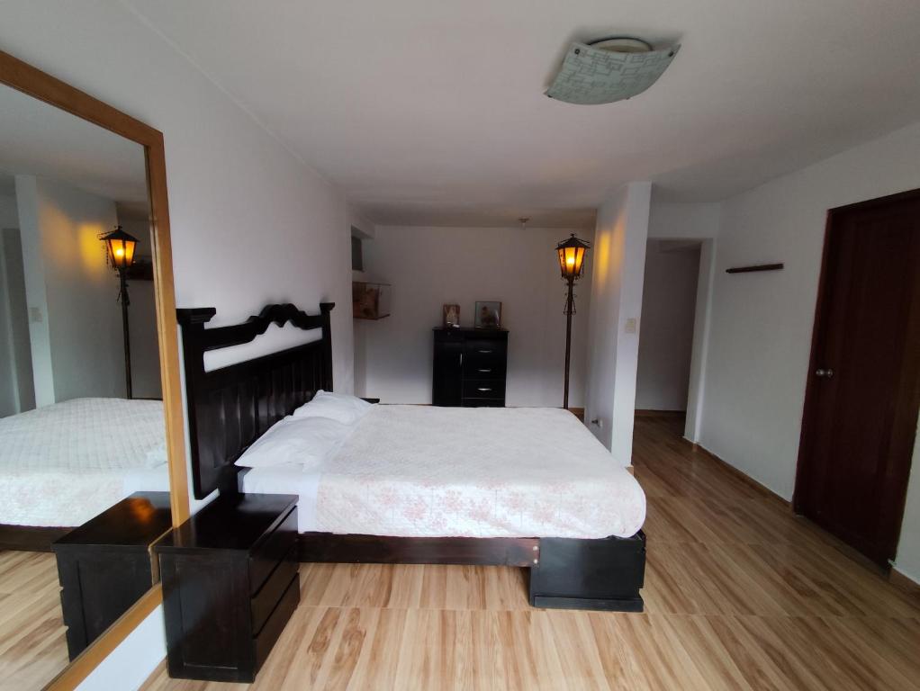 Postel nebo postele na pokoji v ubytování Casa Campo Isabel Quinteros