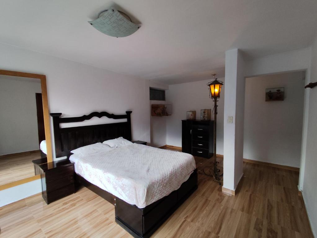 Postel nebo postele na pokoji v ubytování Casa Campo Isabel Quinteros