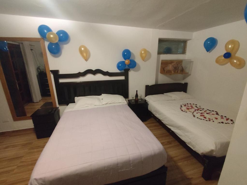 Postel nebo postele na pokoji v ubytování Casa Campo Isabel Quinteros