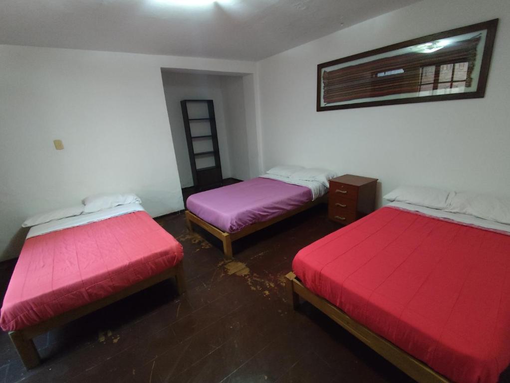 Postel nebo postele na pokoji v ubytování Casa Campo Isabel Quinteros