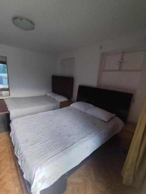 Postel nebo postele na pokoji v ubytování Casa Campo Isabel Quinteros