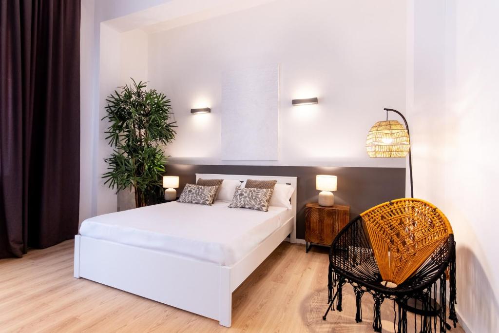 Postel nebo postele na pokoji v ubytování Diletti Rooms