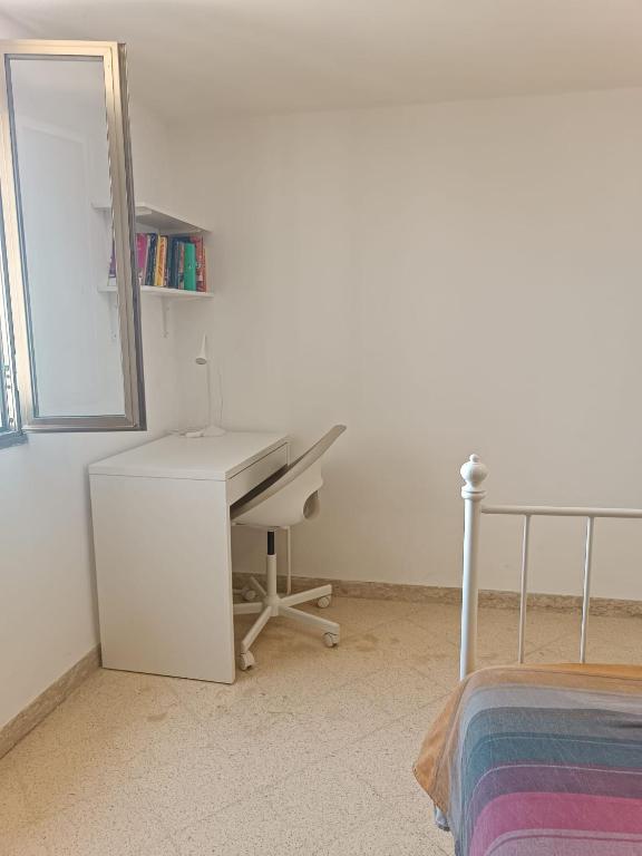 Łóżko lub łóżka w pokoju w obiekcie Casa Domestico
