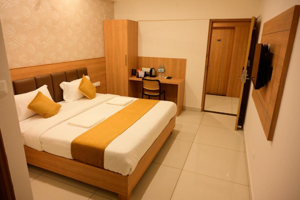 Postel nebo postele na pokoji v ubytování Bimba Hotels