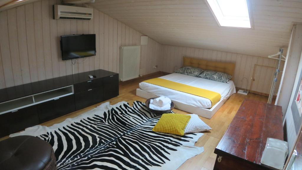 Postel nebo postele na pokoji v ubytování A Nest 4 Family