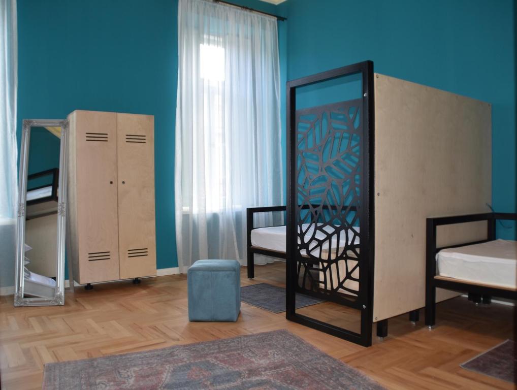 Postel nebo postele na pokoji v ubytování Communa Good Vibes