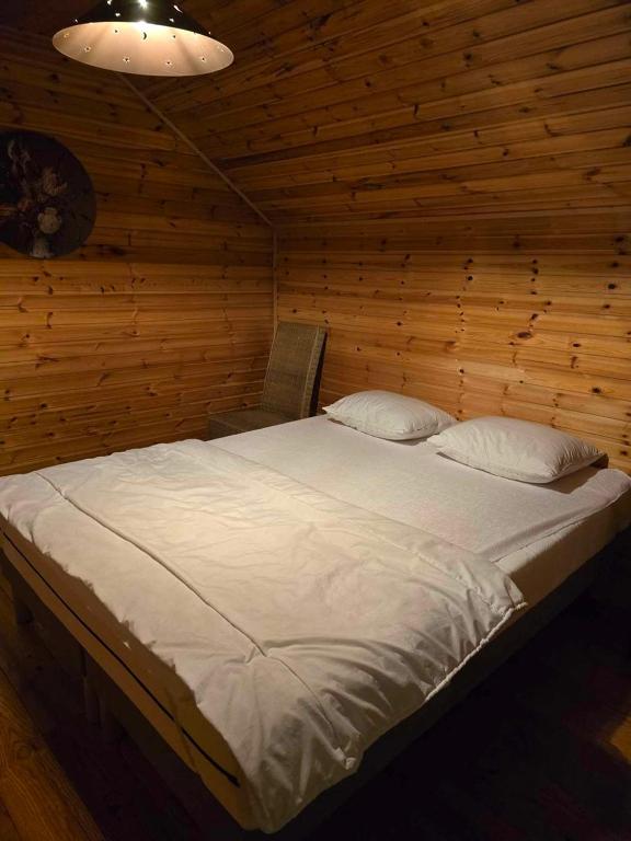 Postel nebo postele na pokoji v ubytování L'Heureux Rêve