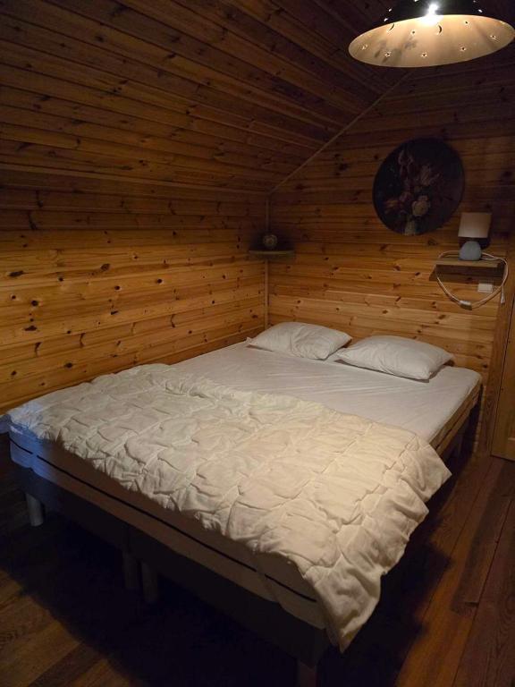 Postel nebo postele na pokoji v ubytování L'Heureux Rêve