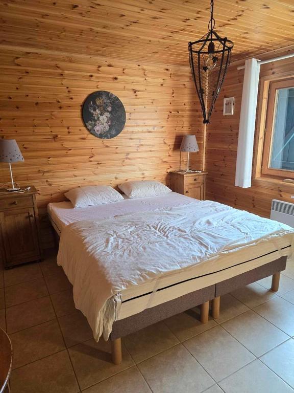 Postel nebo postele na pokoji v ubytování L'Heureux Rêve
