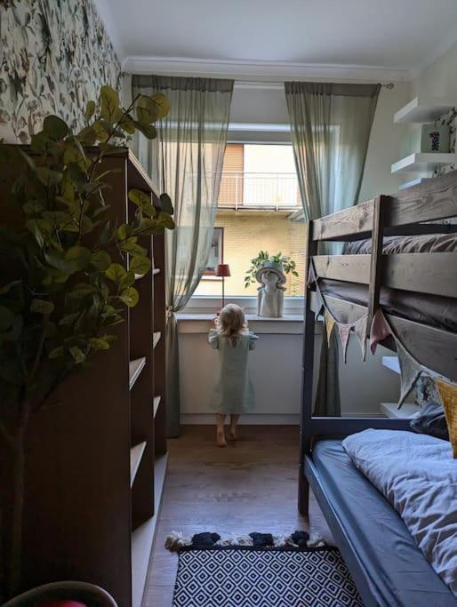 Postel nebo postele na pokoji v ubytování Wohnung mit direktem Seeblick