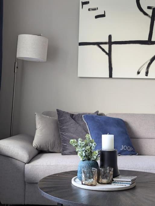 Posezení v ubytování Wohnung mit direktem Seeblick