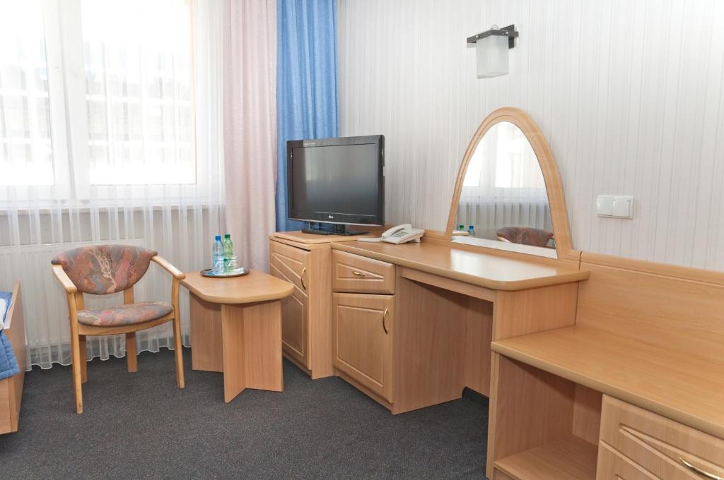 Telewizja i/lub zestaw kina domowego w obiekcie Vistula Hotel