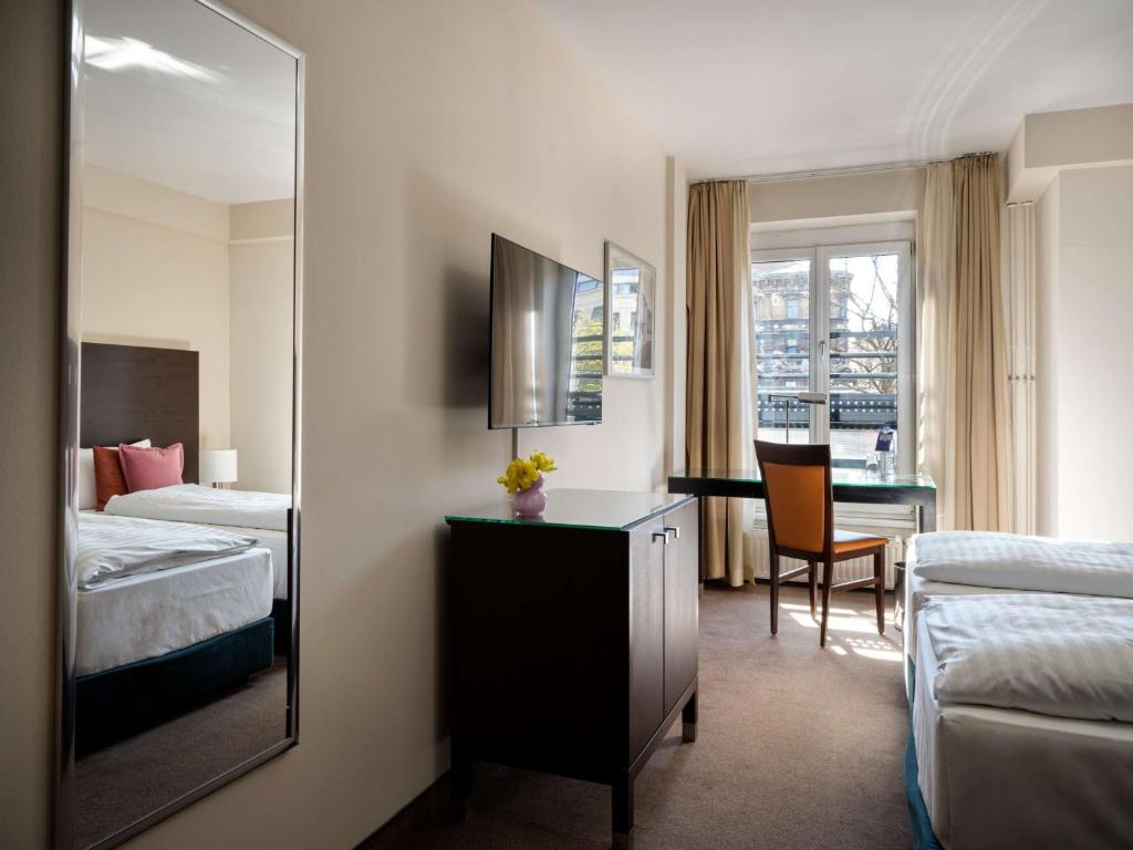 Postel nebo postele na pokoji v ubytování Flemings Hotel Wien-Stadthalle
