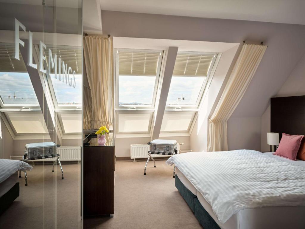 Postel nebo postele na pokoji v ubytování Flemings Hotel Wien-Stadthalle