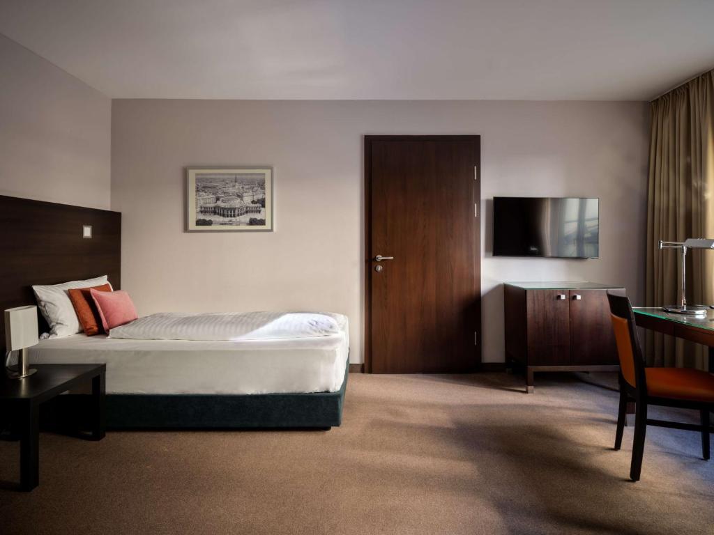 Postel nebo postele na pokoji v ubytování Flemings Hotel Wien-Stadthalle