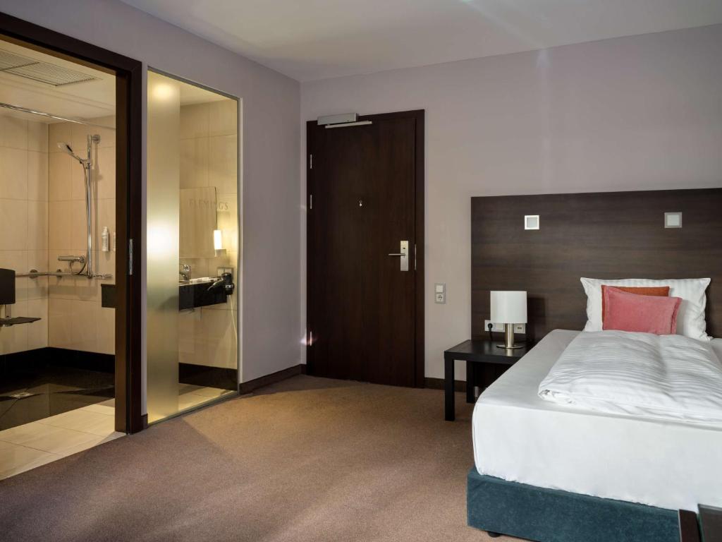 Postel nebo postele na pokoji v ubytování Flemings Hotel Wien-Stadthalle