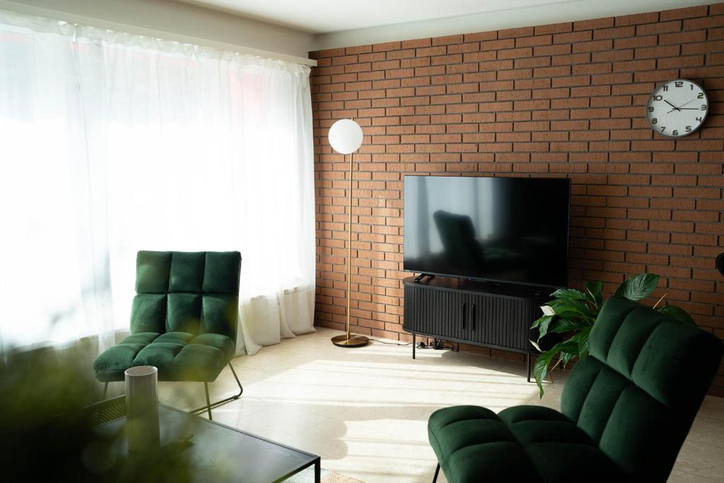 TV a/nebo společenská místnost v ubytování NH 7 Interlaken-Luzern I Lake I Mountain I connect