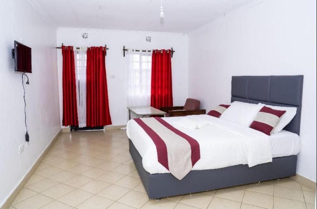 Postel nebo postele na pokoji v ubytování Olsupat Lodge
