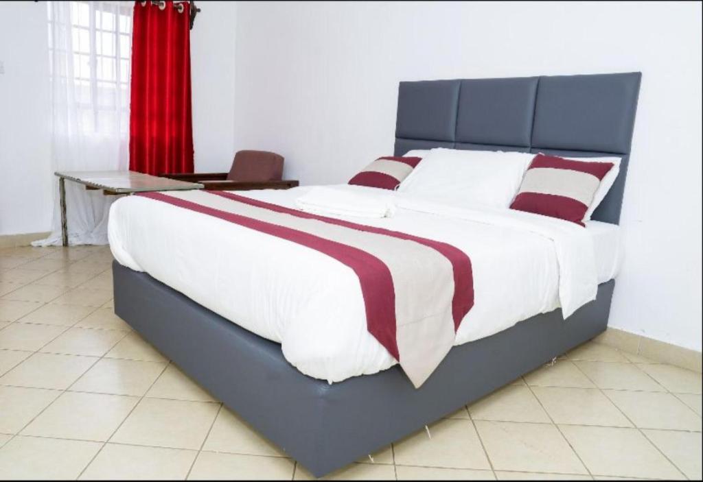 Postel nebo postele na pokoji v ubytování Olsupat Lodge