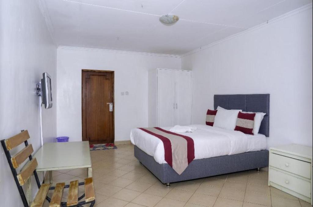 Postel nebo postele na pokoji v ubytování Olsupat Lodge
