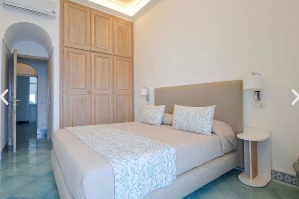 Postel nebo postele na pokoji v ubytování Casa Adelaide