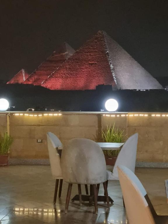 Afbeelding uit fotogalerij van Gardenia Pyramids view inn in Caïro
