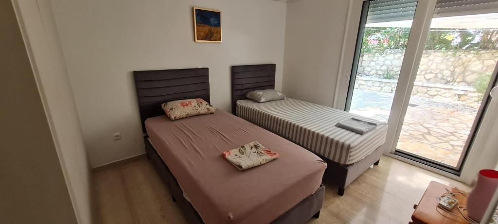 Posteľ alebo postele v izbe v ubytovaní Gerys house