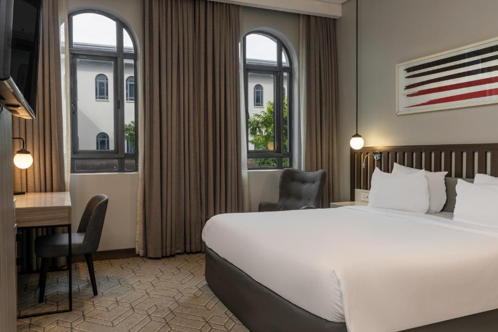 Ένα ή περισσότερα κρεβάτια σε δωμάτιο στο Radisson Lagos Ikeja