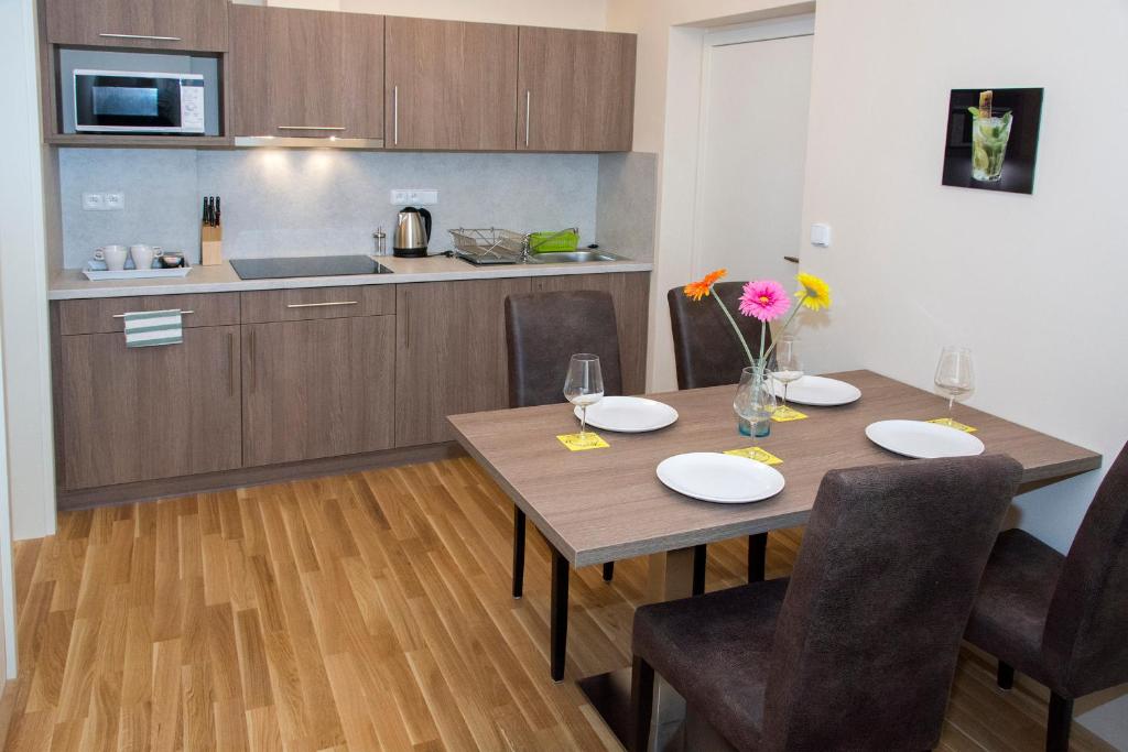 Kuchyň nebo kuchyňský kout v ubytování Limes Apartments