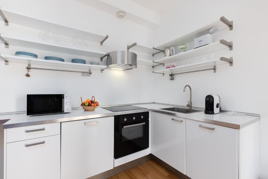 Kuchyňa alebo kuchynka v ubytovaní Moscova Design Home