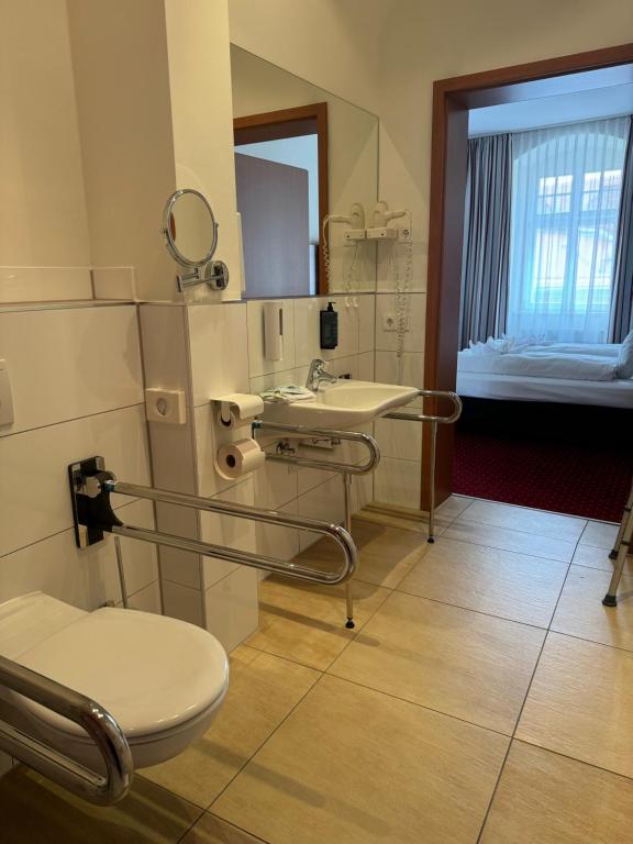 Koupelna v ubytování Hotel Schwibbogen Altstadt & Appartements