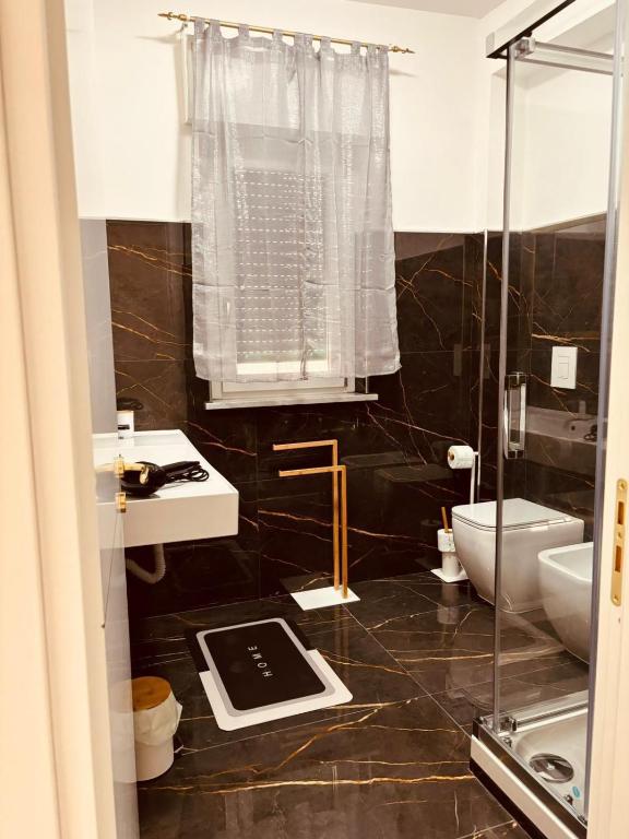 Koupelna v ubytování B&B A un passo dal mare
