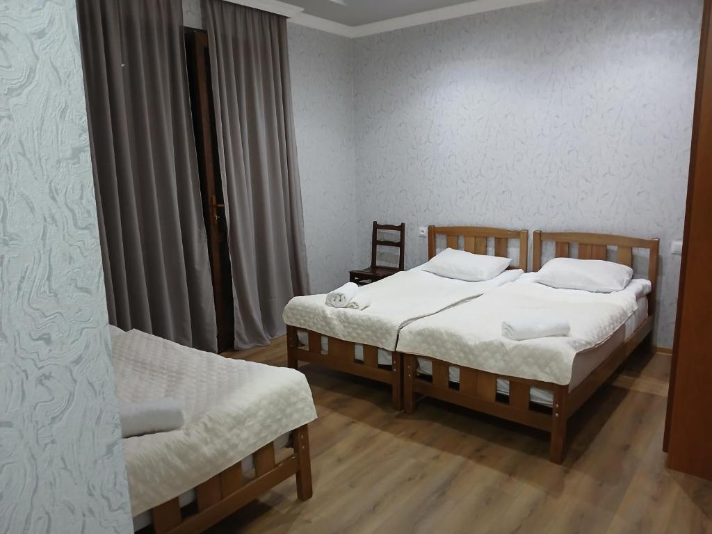 Postel nebo postele na pokoji v ubytování Mishgu Qor