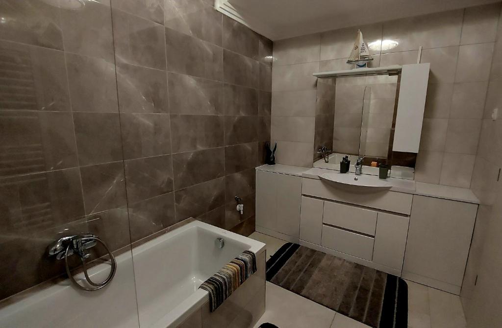 Kúpeľňa v ubytovaní Kikötő Sétány Apartman I.