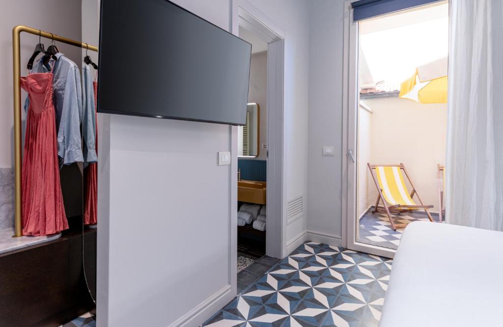 Postel nebo postele na pokoji v ubytování Riva Rooms