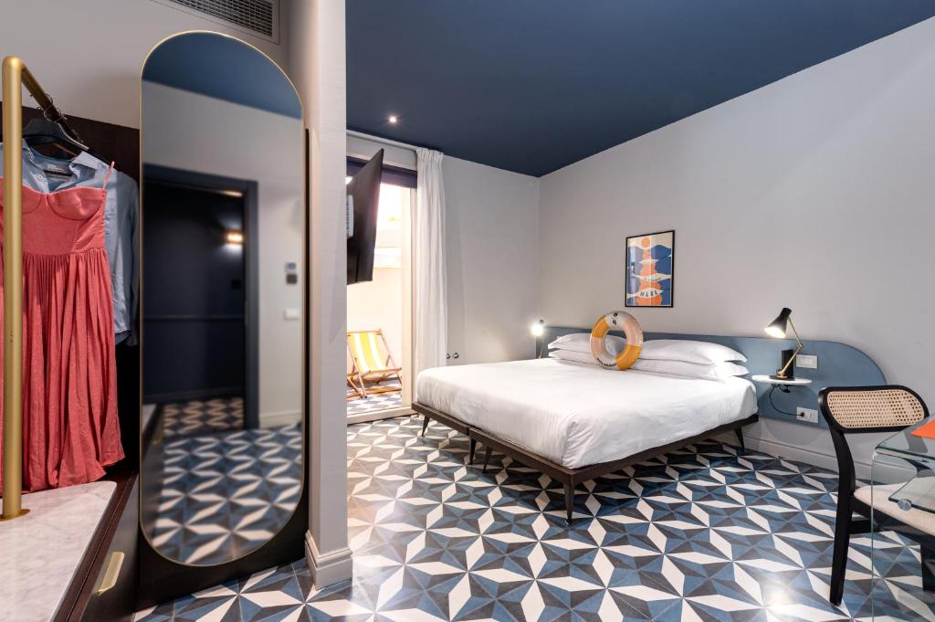 Postel nebo postele na pokoji v ubytování Riva Rooms