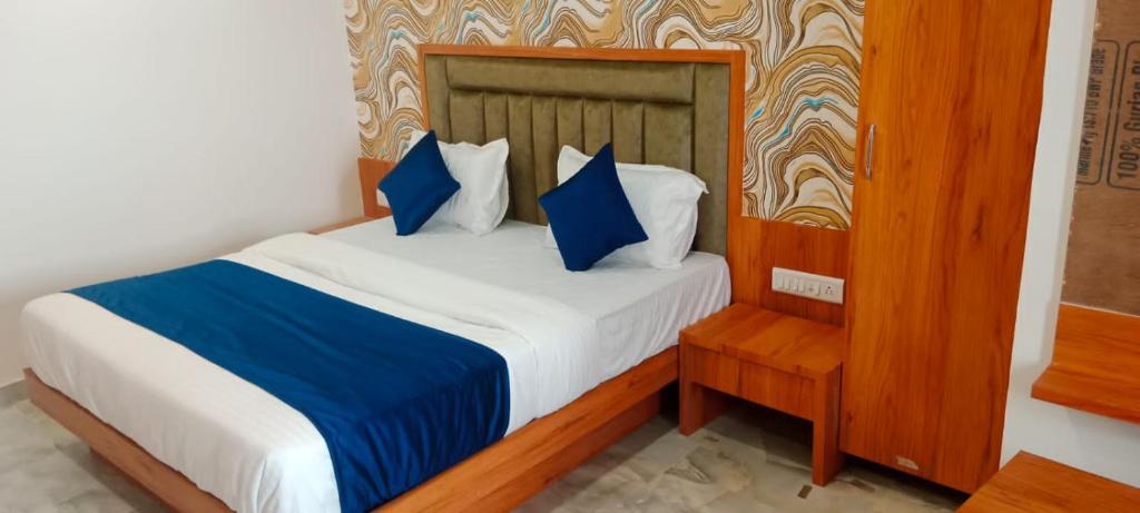 Postel nebo postele na pokoji v ubytování Hotel Nobel Inn