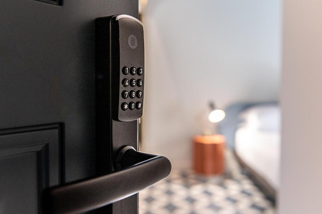 Postel nebo postele na pokoji v ubytování Riva Rooms