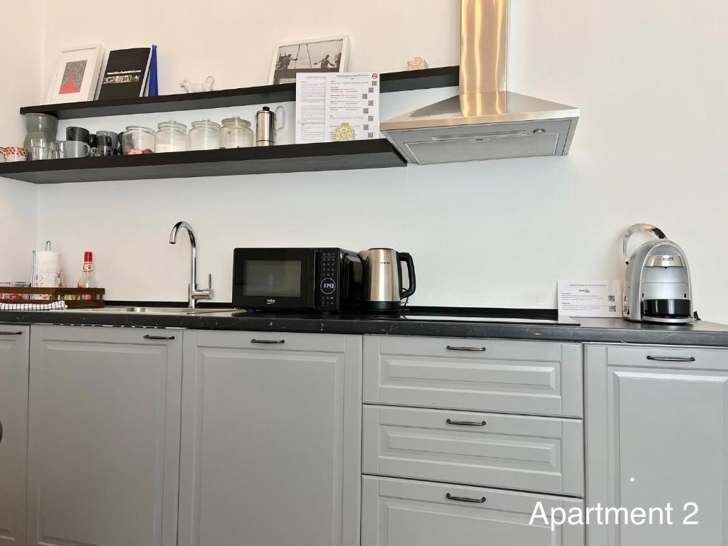 Cucina o angolo cottura di MeModena Apartments