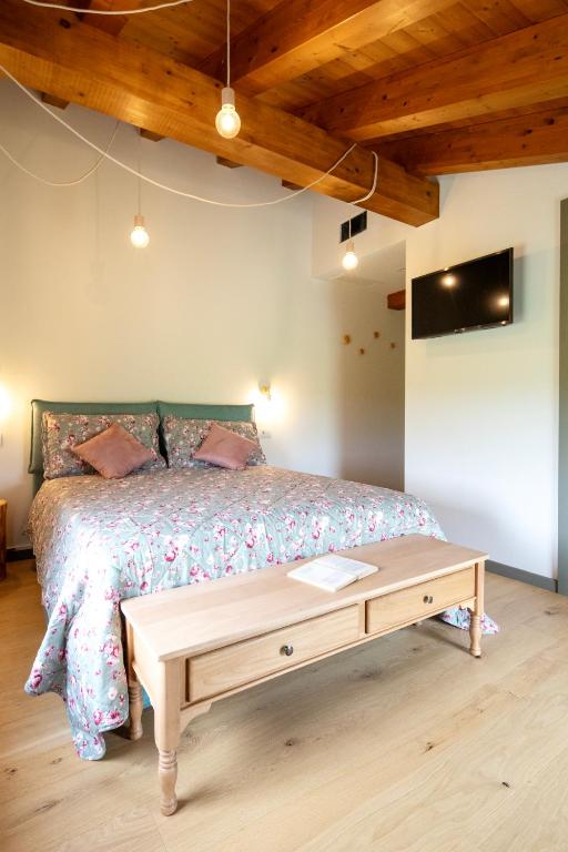 Postel nebo postele na pokoji v ubytování Agriturismo La Rosarnetta