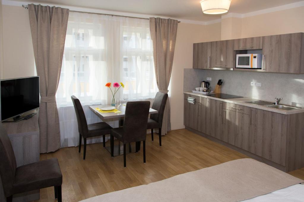 Kuchyň nebo kuchyňský kout v ubytování Limes Apartments